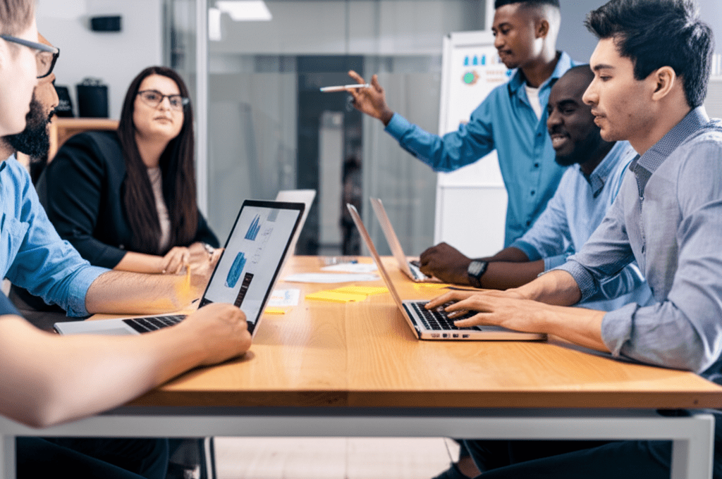 A professional business meeting scene with diverse startup founders and a fractional CTO discussing technology strategy in a modern office environment