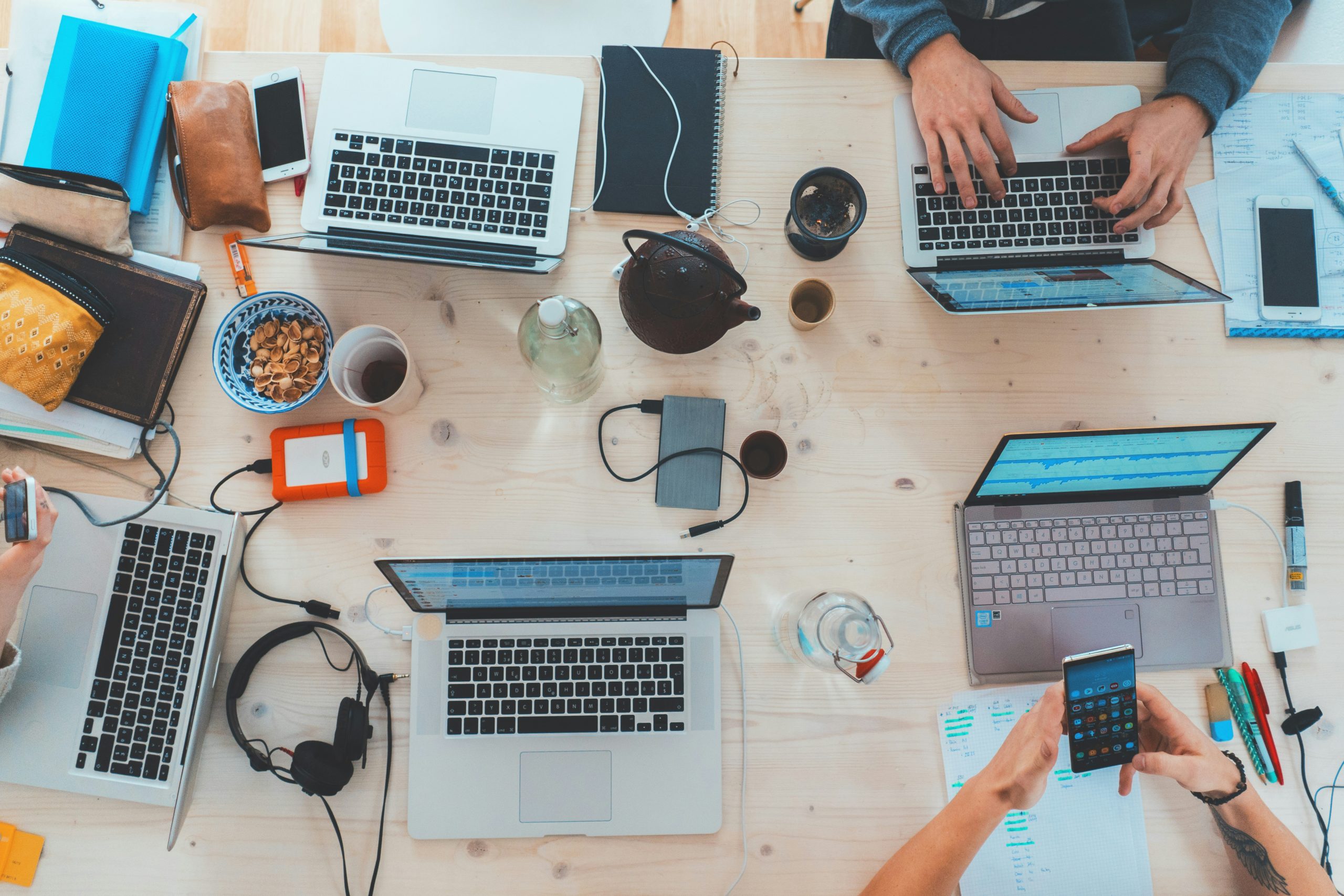 Diverse technology leaders collaborating in a modern office environment representing CTO roles and technology strategy